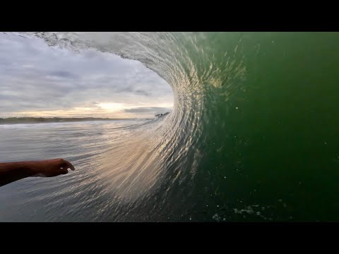 Swooping under the hood and getting spit out | RAW SURF POV beach break barrels