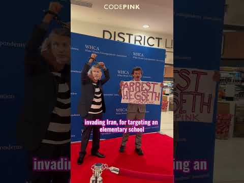 PEACE ACTIVISTS REMOVED BY FORCE  WHILE WAR CRIMINALS PARTY INSIDE