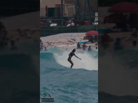 Pro Surfer Kelis cruises down the line
