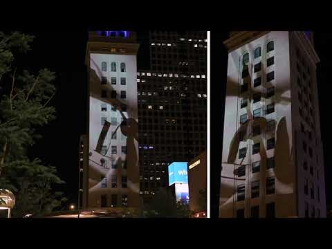 "Surreal Engine" by Lightbrush in the June 2025 Night Lights Denver Projection Mapping Installation