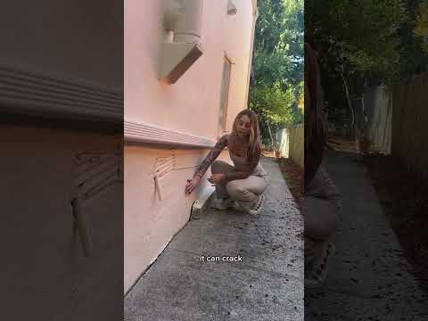 A simple but effective concrete curb wall can keep moisture away from the framing of your home when
