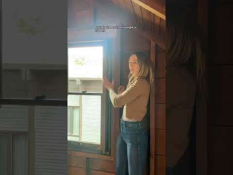 The simple but cool mechanics of double hung windows with counterweights — usually obscured behind
